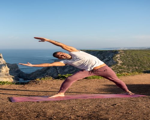 man doing stretching and physical activity outdoors
